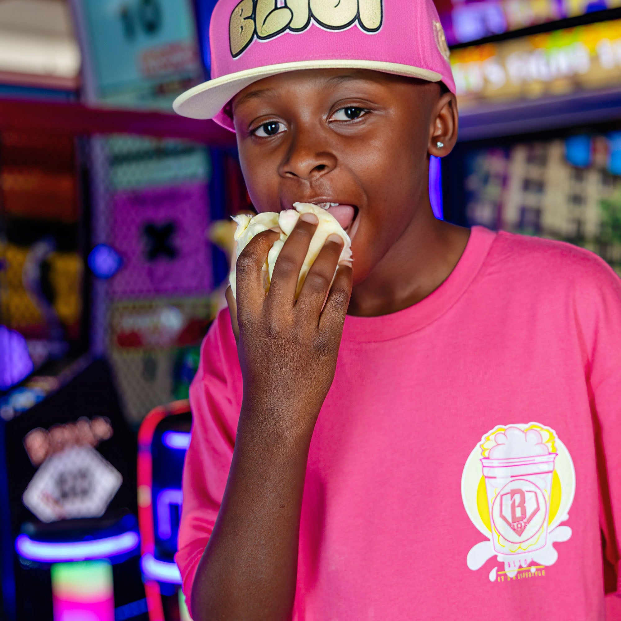 Youth model wearing Sweet Spot Pink Lemonade youth graphic tee