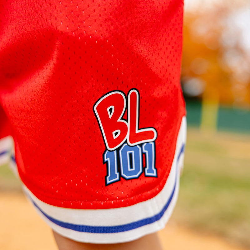close up of red shorts with 'BL101' logo 