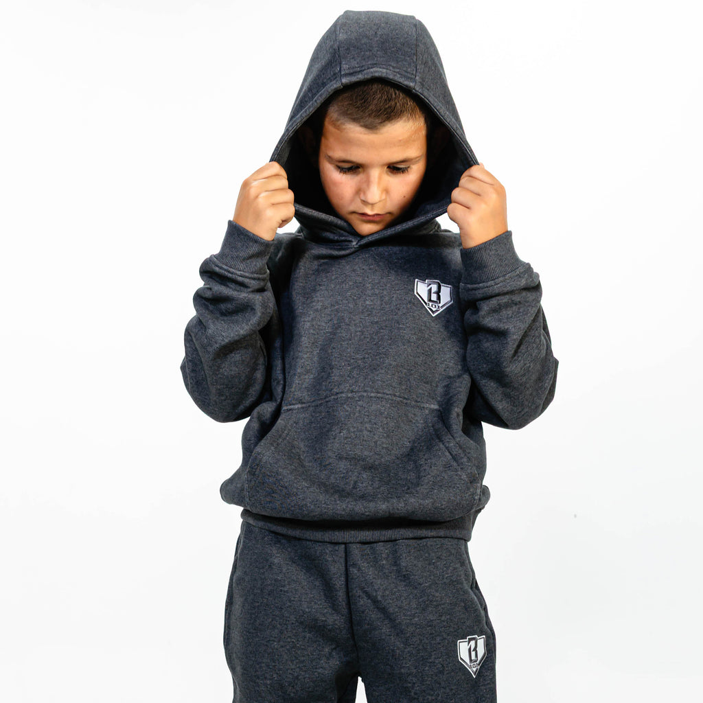 Youth model wearing Gray Baseline hoodie