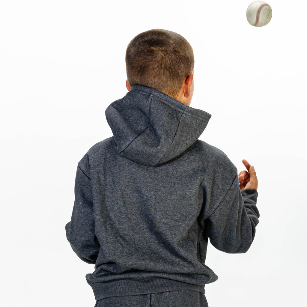 Youth model wearing Gray Baseline joggers