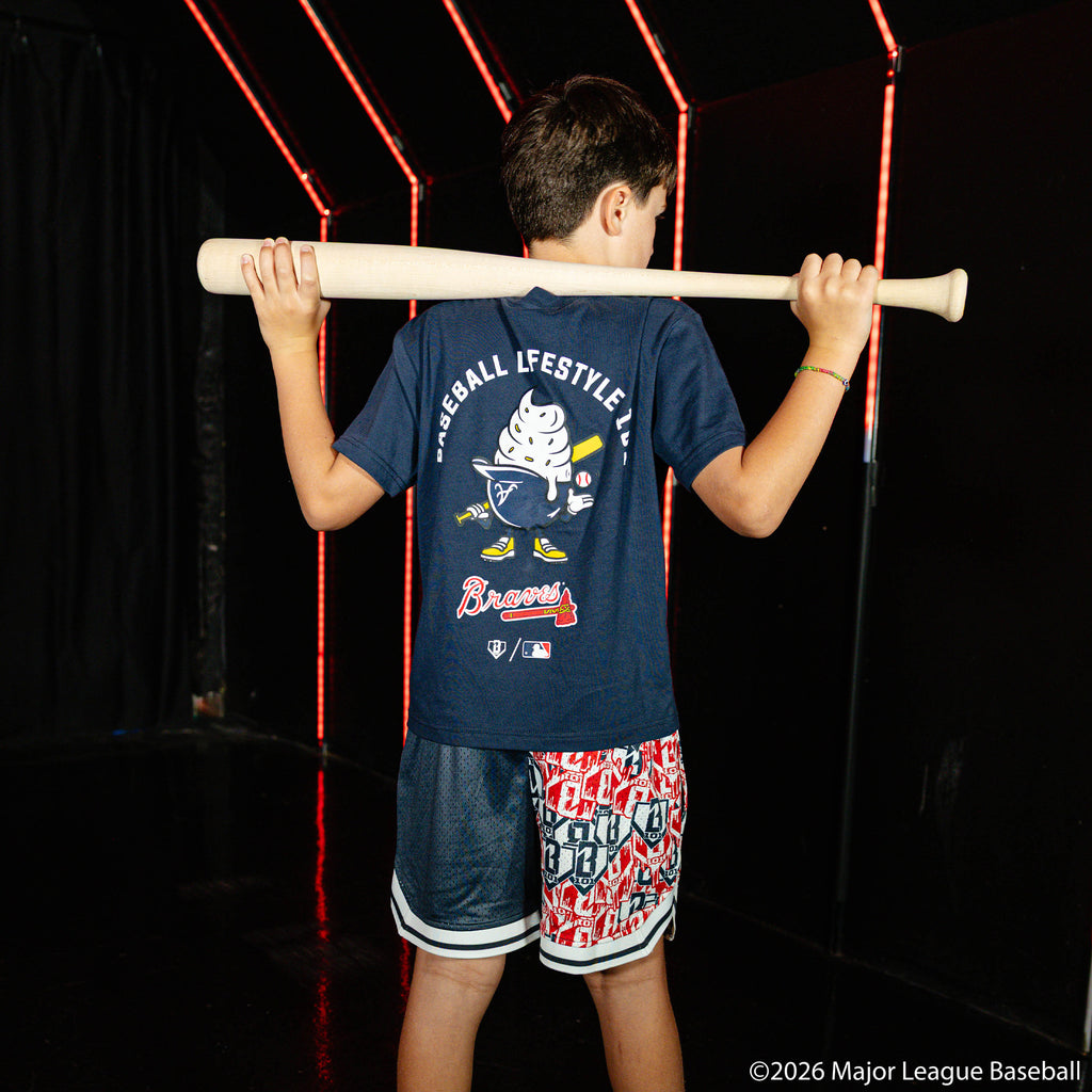Youth model wearing navy youth graphic tee with "Atlanta Braves Ice Cream" design