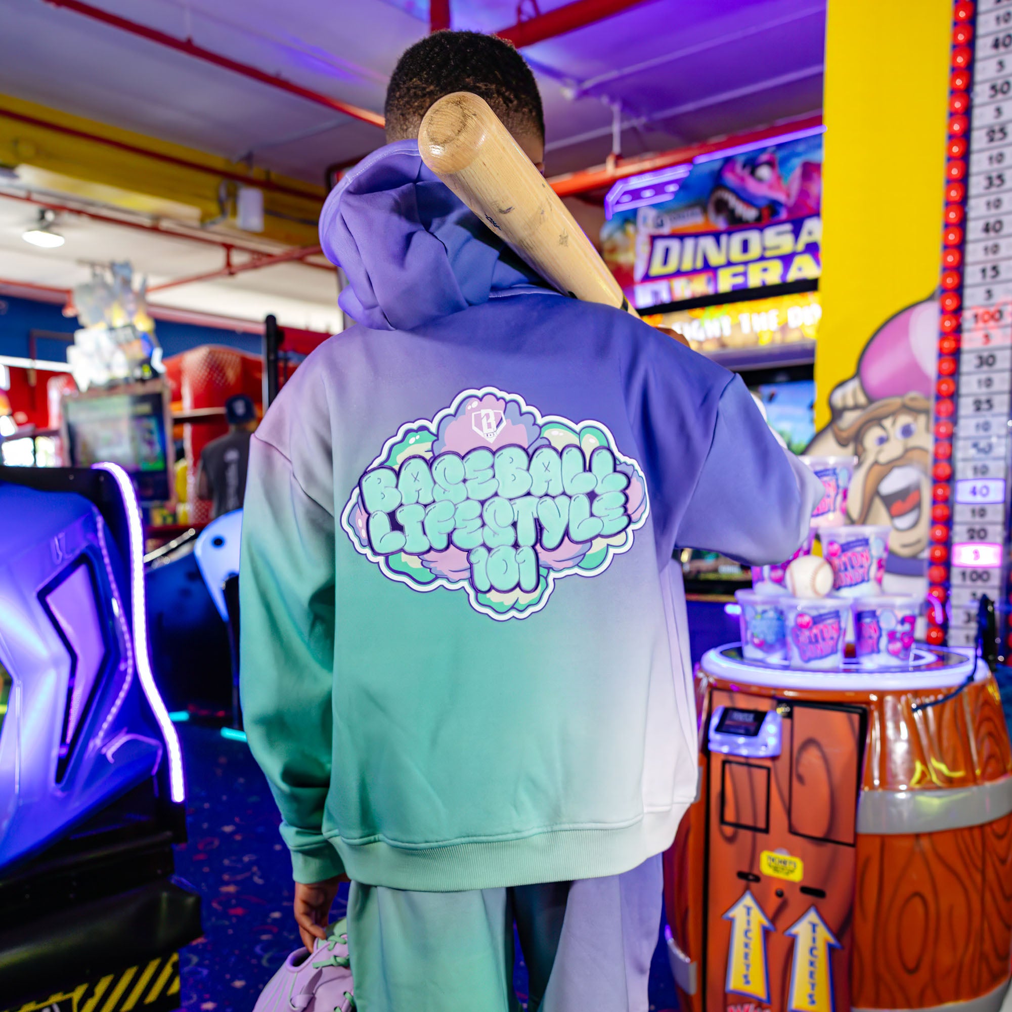 Youth model wearing Cotton Candy Galaxy Grape youth hoodie