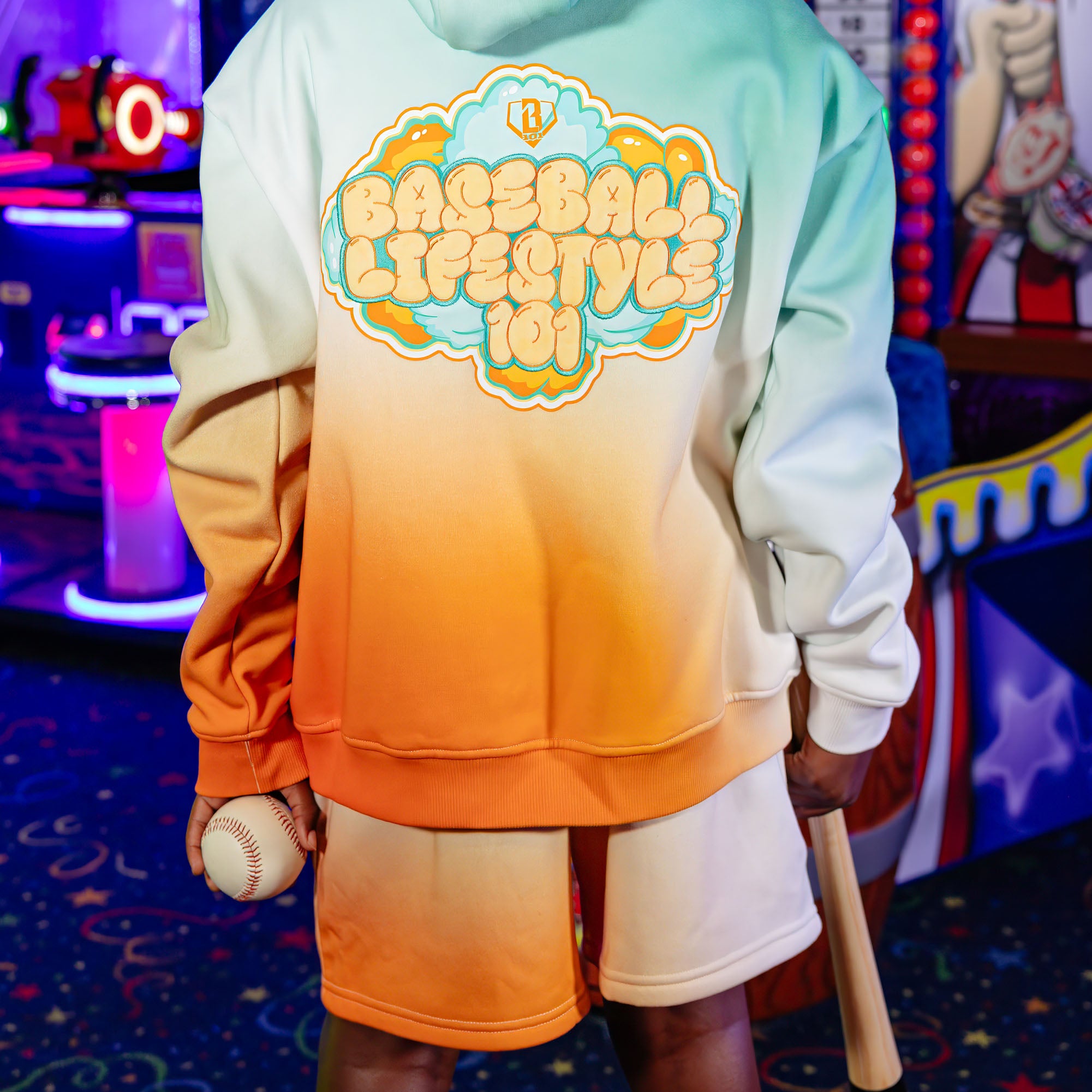 Youth model wearing Cotton Candy Tangerine Freeze youth shorts