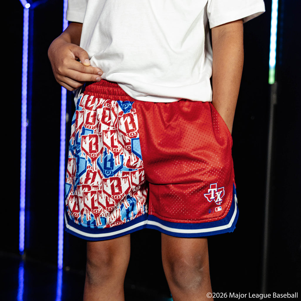 Youth model wearing red youth shorts with "Texas Rangers Sticker Court" design