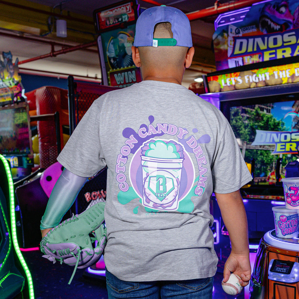 Youth model wearing Sweet Spot Galaxy Grape youth graphic tee
