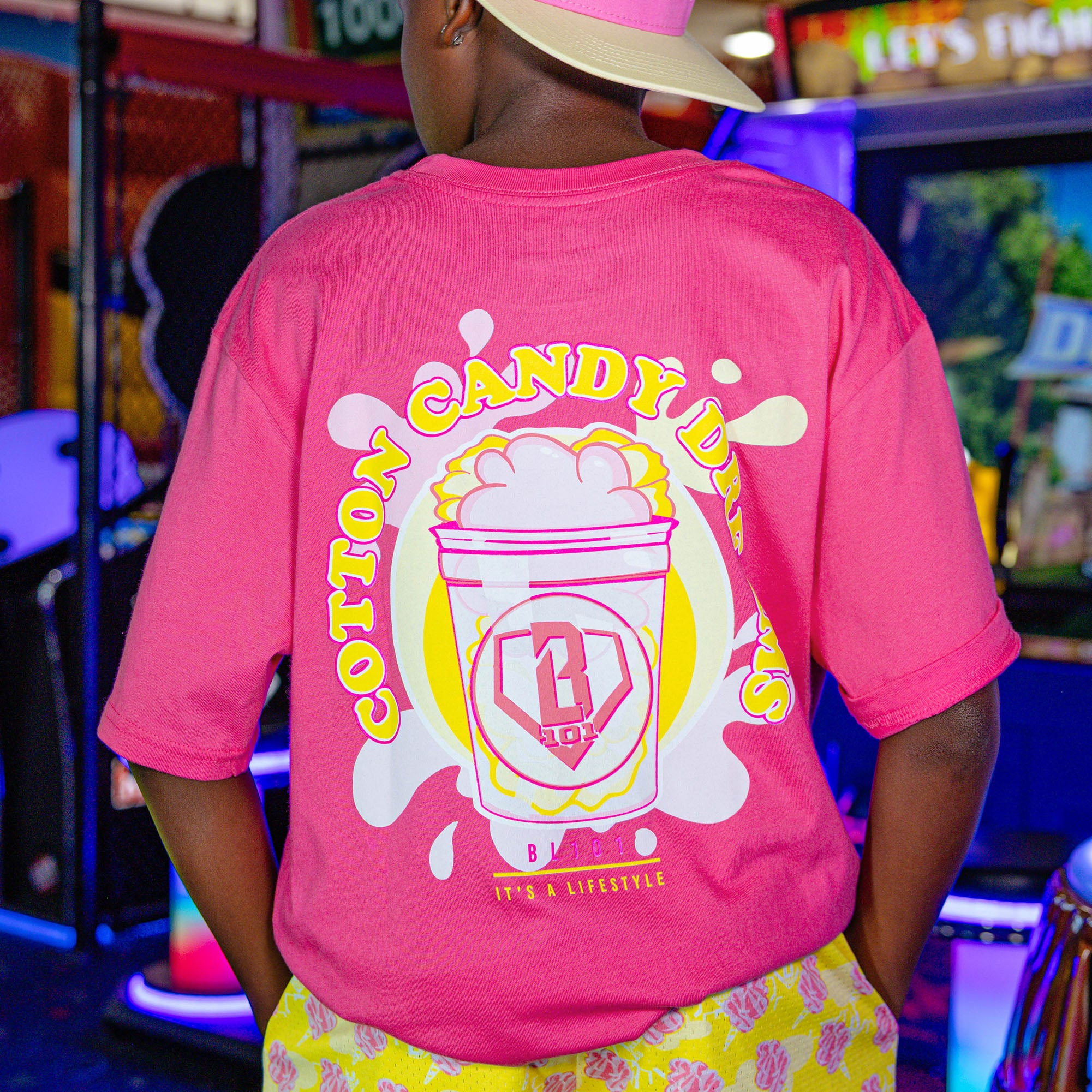 Youth model wearing Sweet Spot Pink Lemonade youth graphic tee