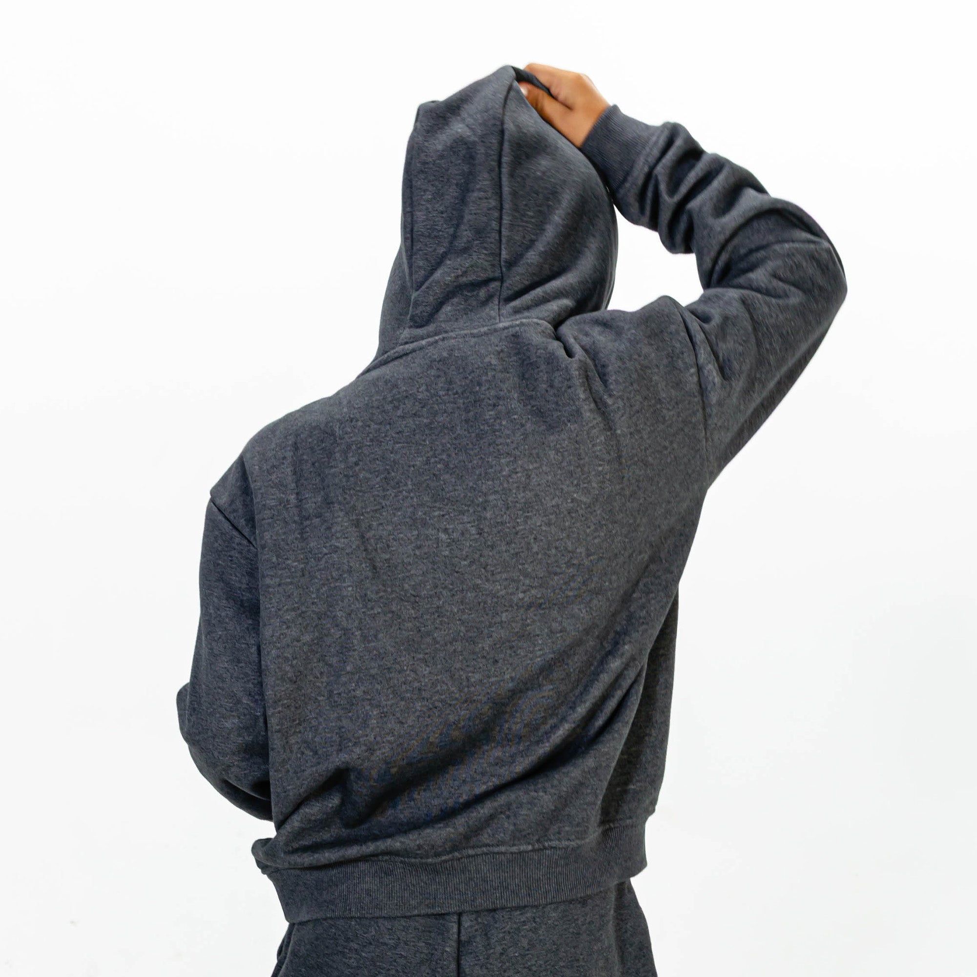 Youth model wearing Gray Baseline hoodie