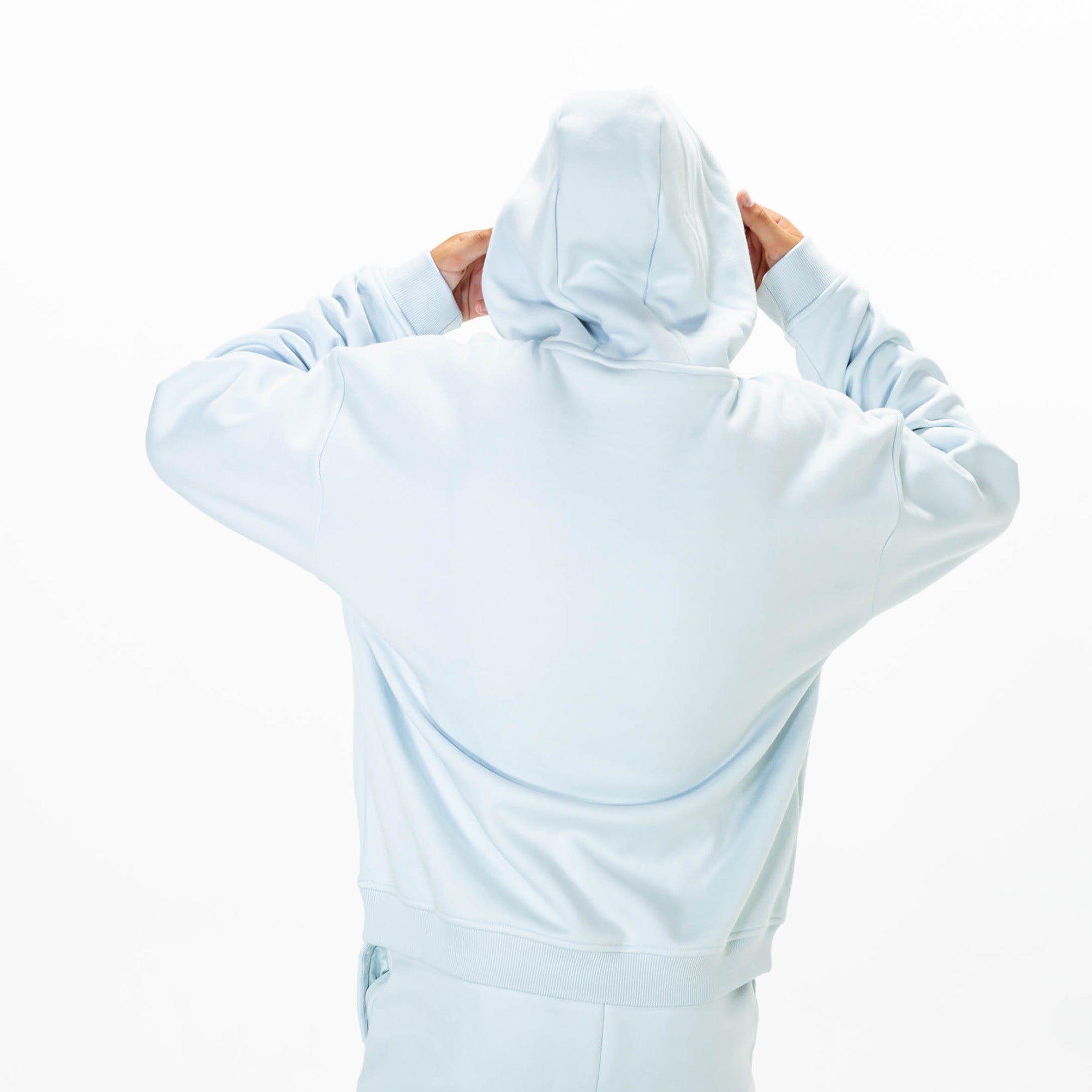 Youth model wearing Blue Baseline joggers