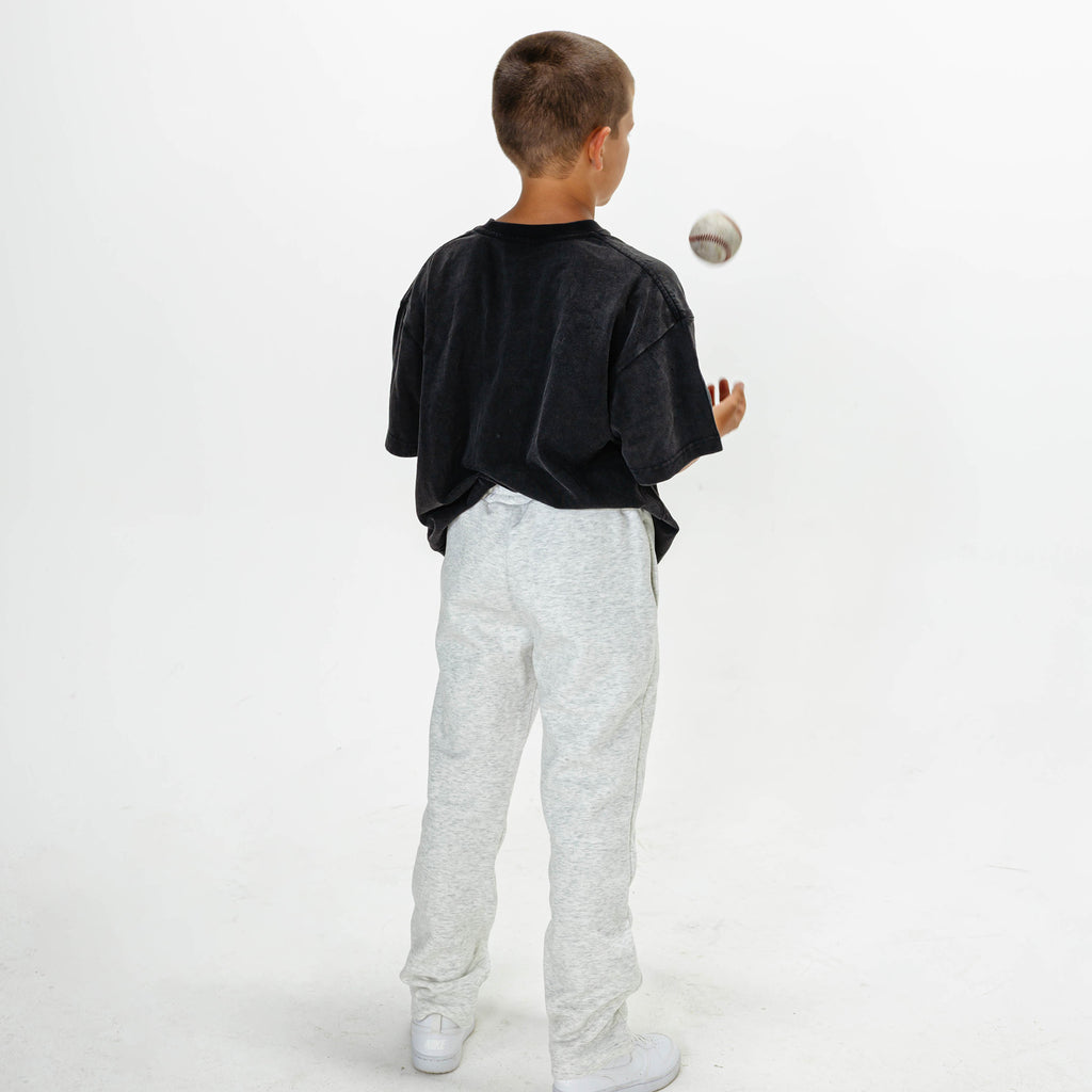 Youth model wearing Gray Baseline Straight Leg sweatpants