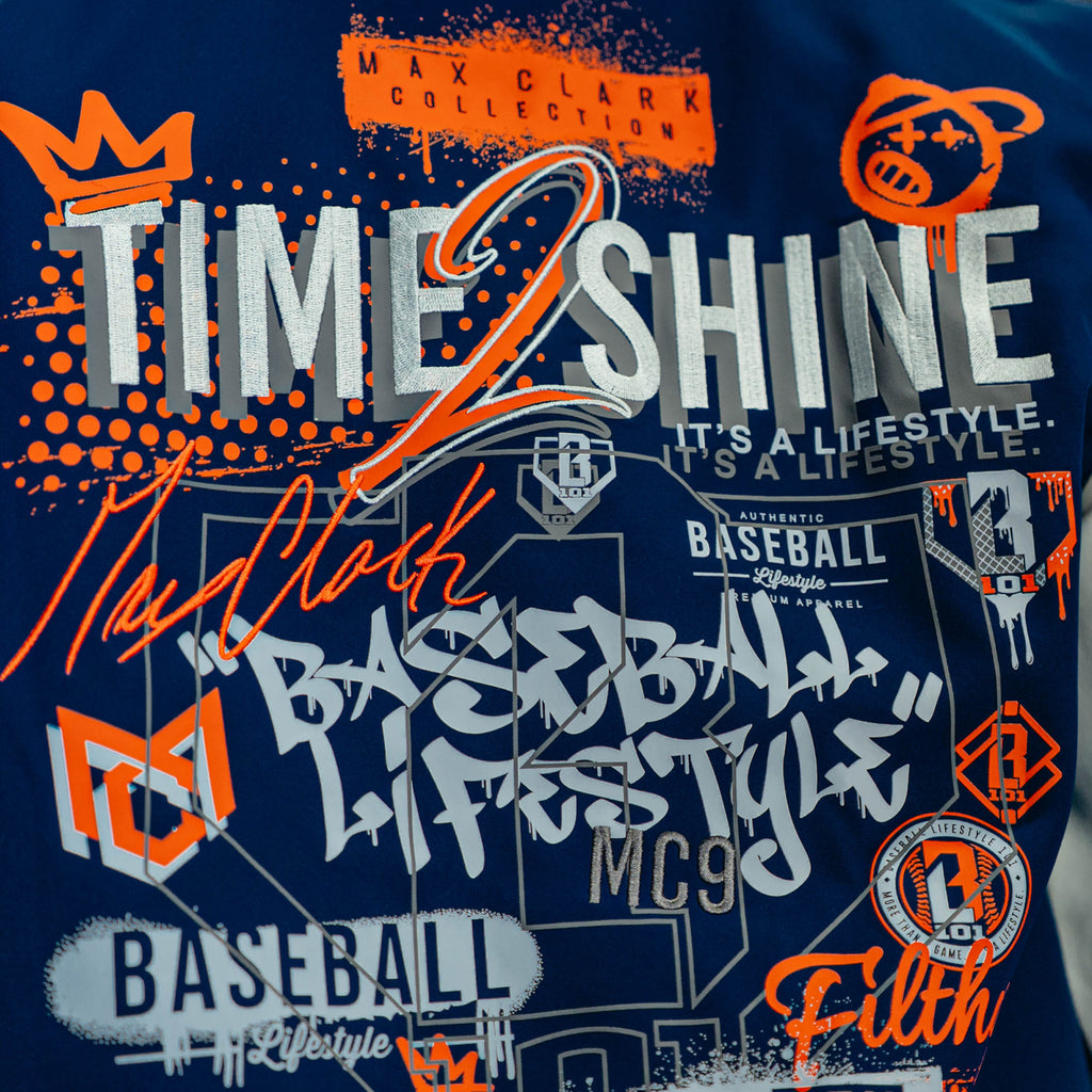 Baseball-themed t-shirt with various graphics and text on a blue background