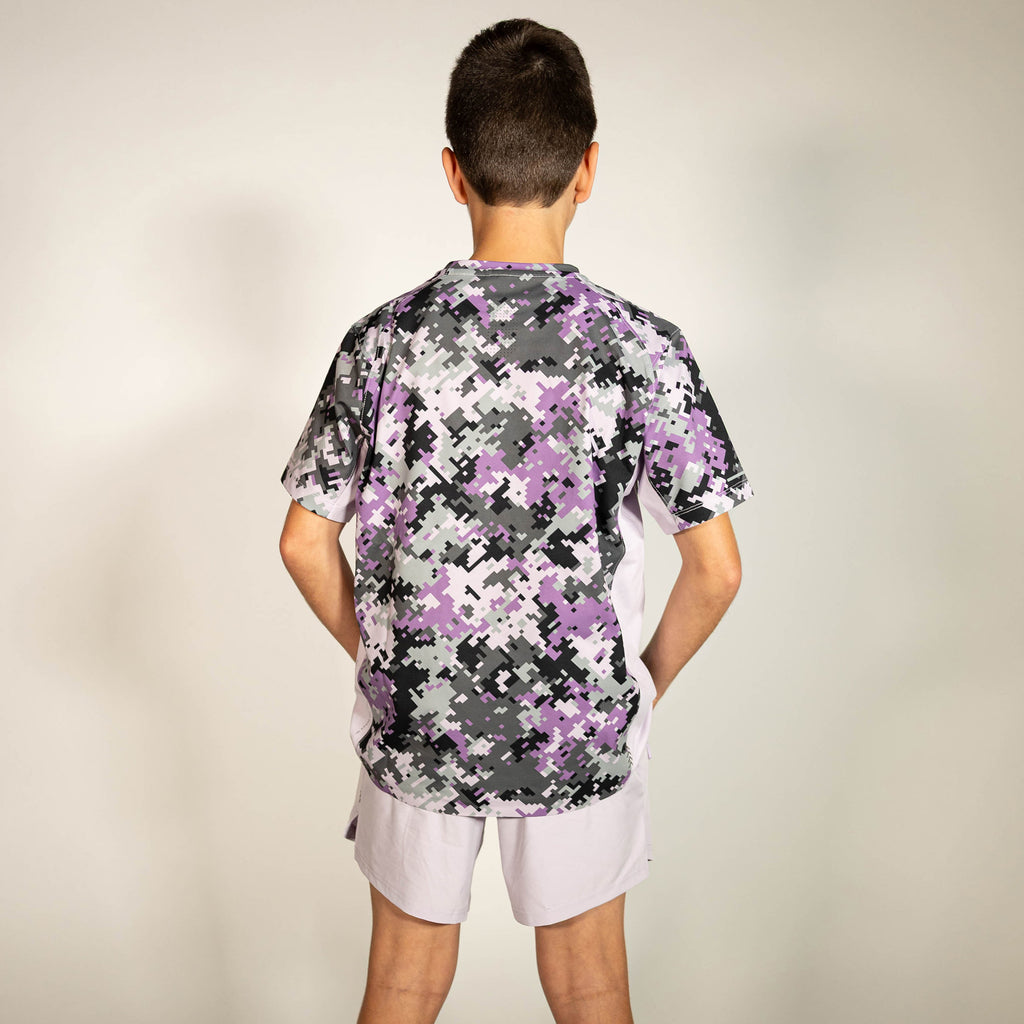 Youth model wearing purple Pro Series V2 youth shorts with liner