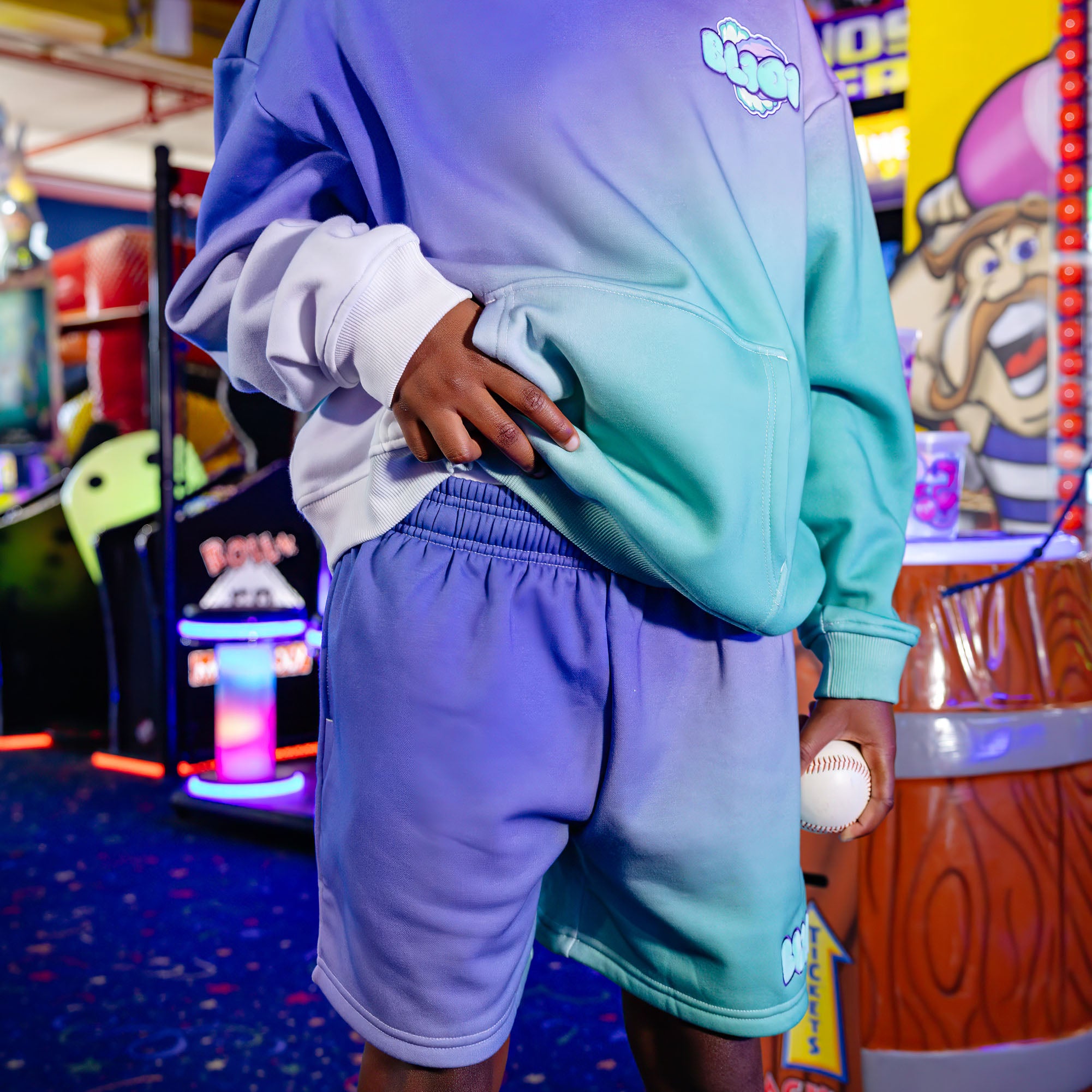 Youth model wearing Cotton Candy Galaxy Grape youth shorts