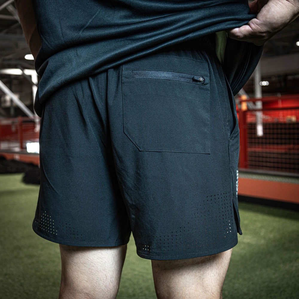 Adult model wearing black Pro Series with Liner shorts