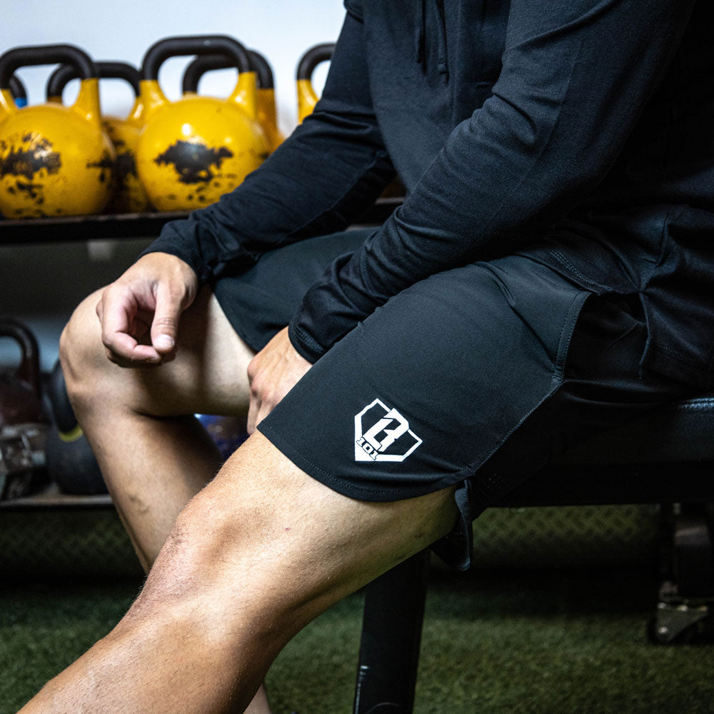 Adult model wearing black Pro Series with Liner shorts