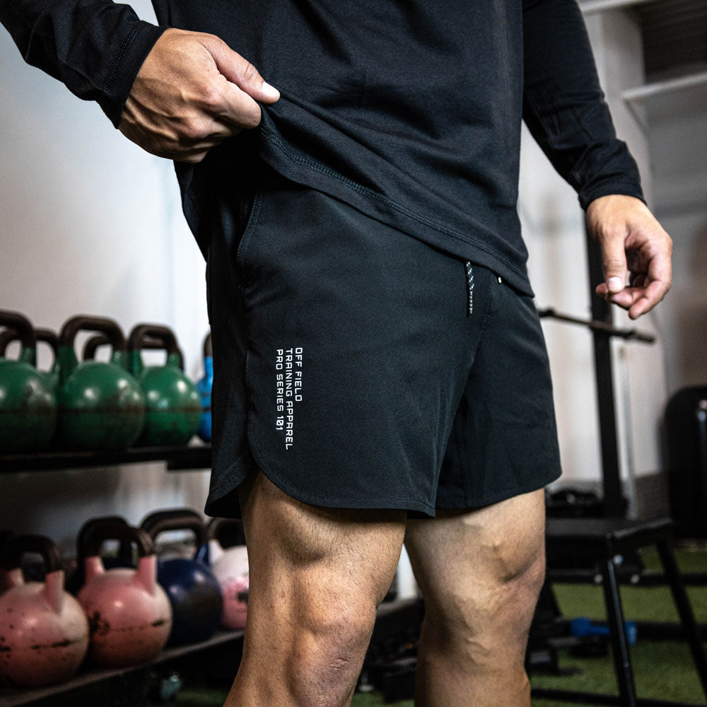 Adult model wearing black Pro Series with Liner shorts