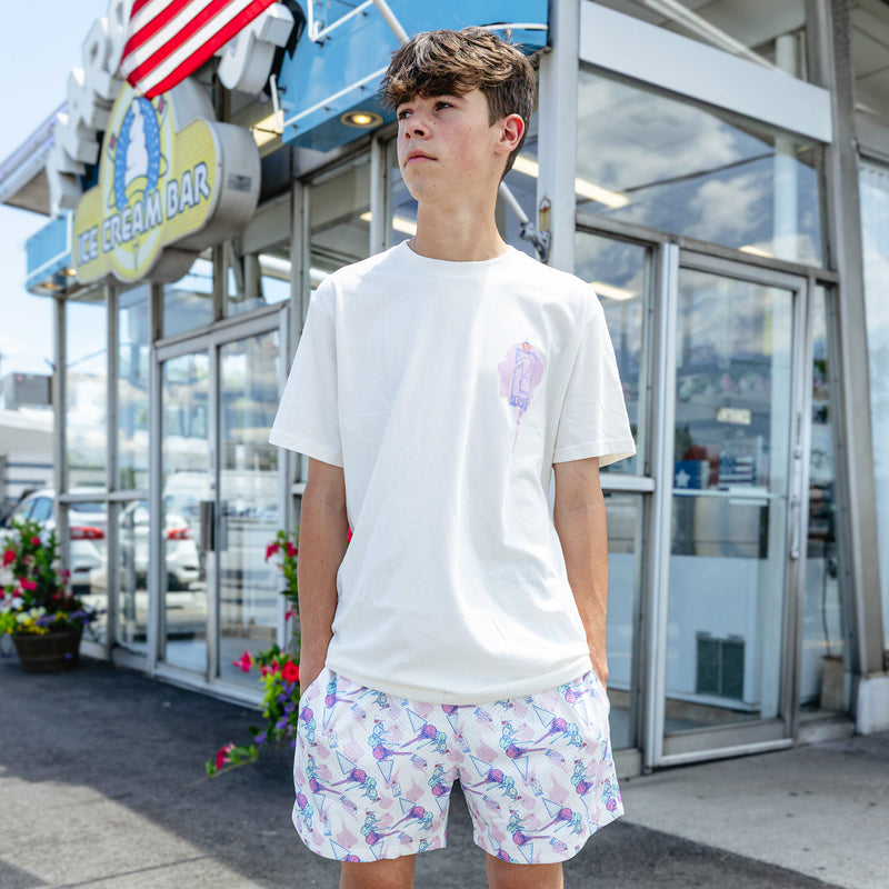 Adult model wearing shorts with "Fastball Scoops" design