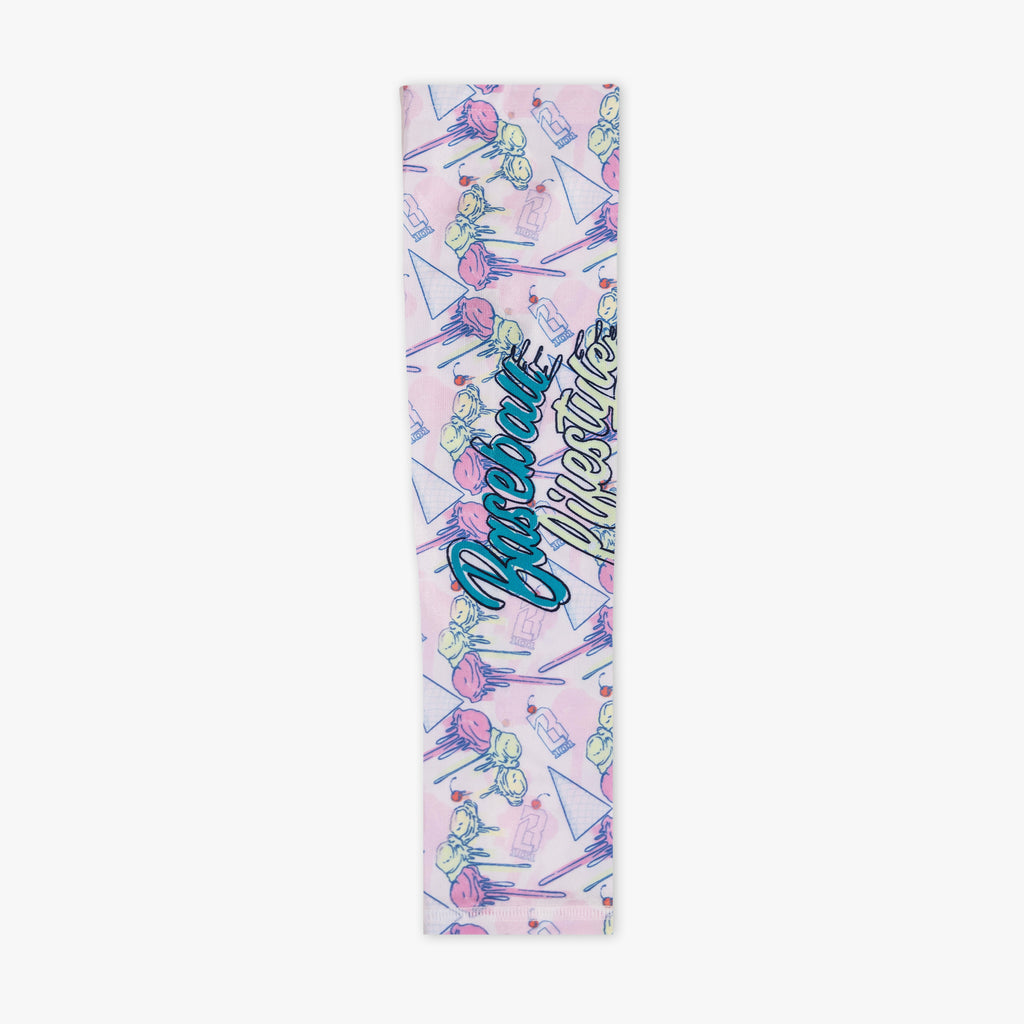 Youth model wearing youth sleeve with "Fastball Scoops Arm Sleeve" design