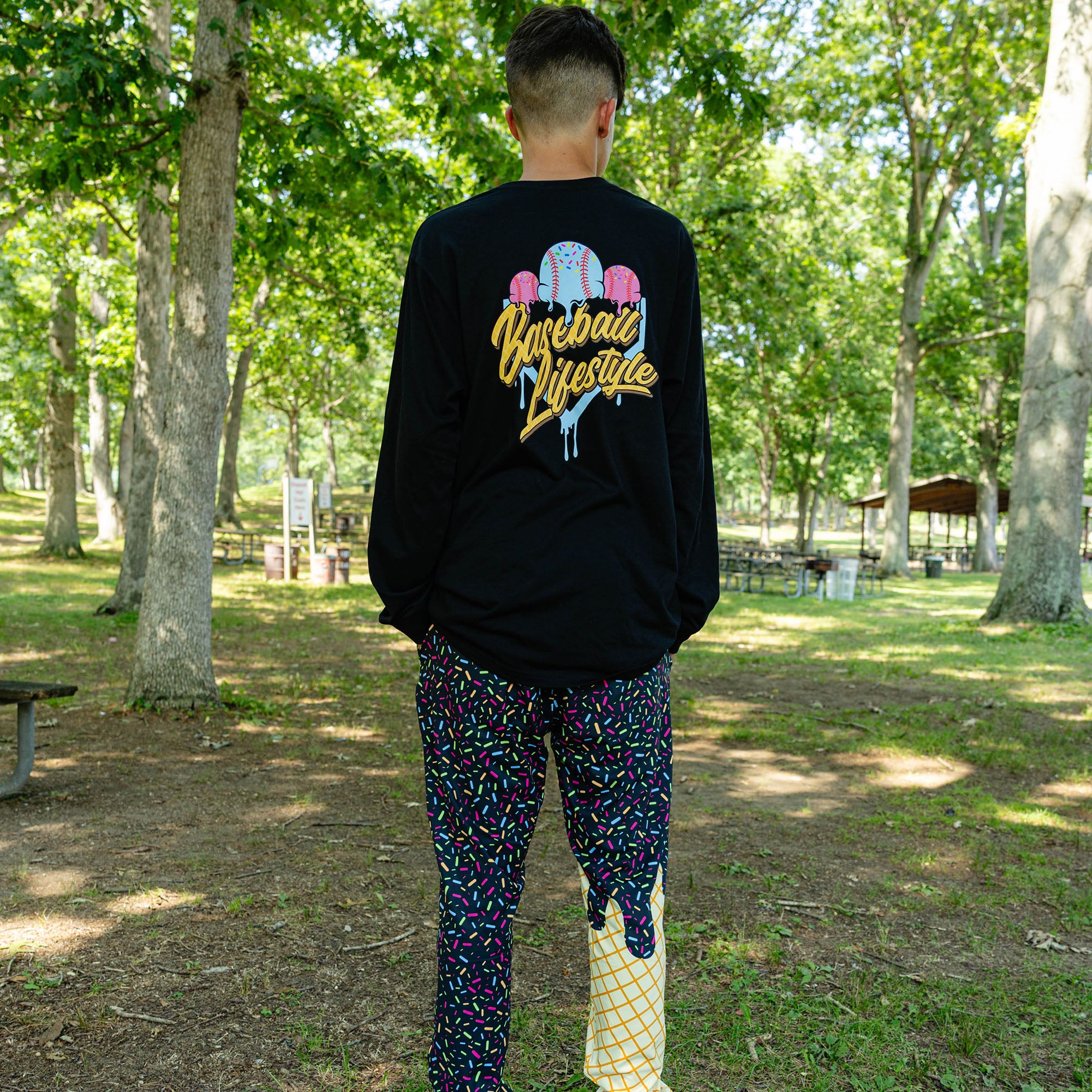 Adult model wearing ice Cream Pajama Pants Midnight Sundae pants
