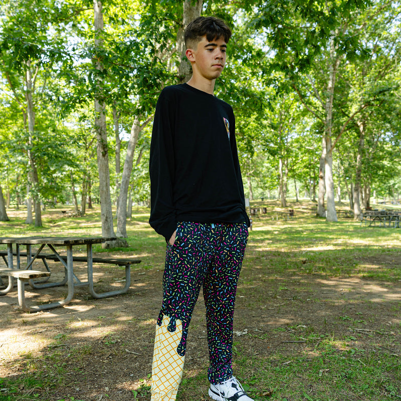 Adult model wearing ice Cream Pajama Pants Midnight Sundae pants