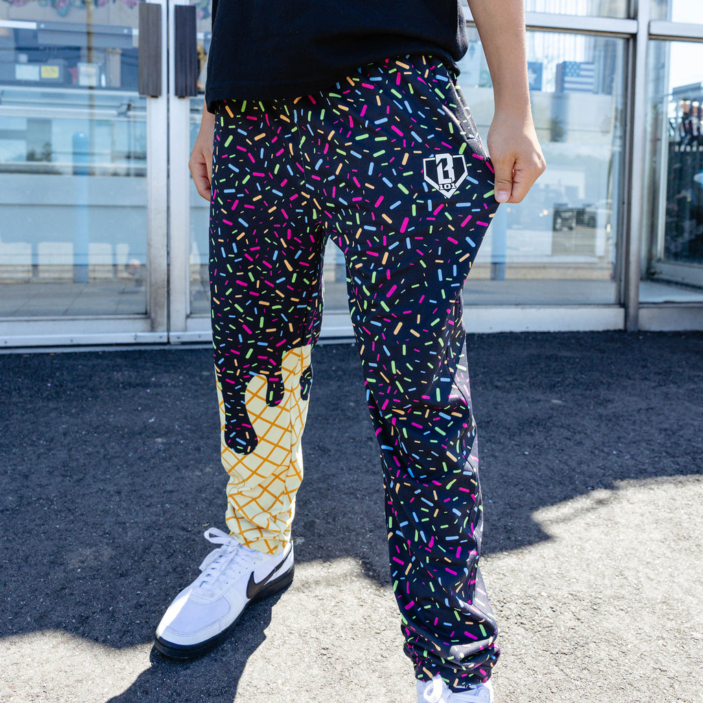 Youth model wearing ice Cream Pajama Pants Midnight Sundae youth pants