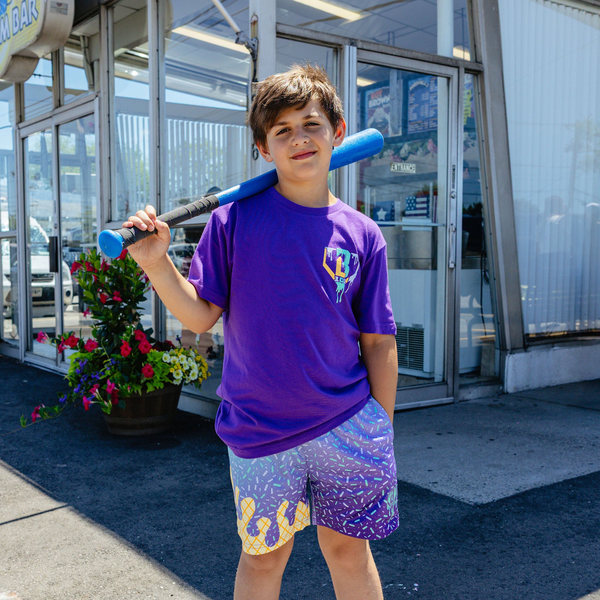 Youth model wearing ice Cream Galaxy Grape youth shorts