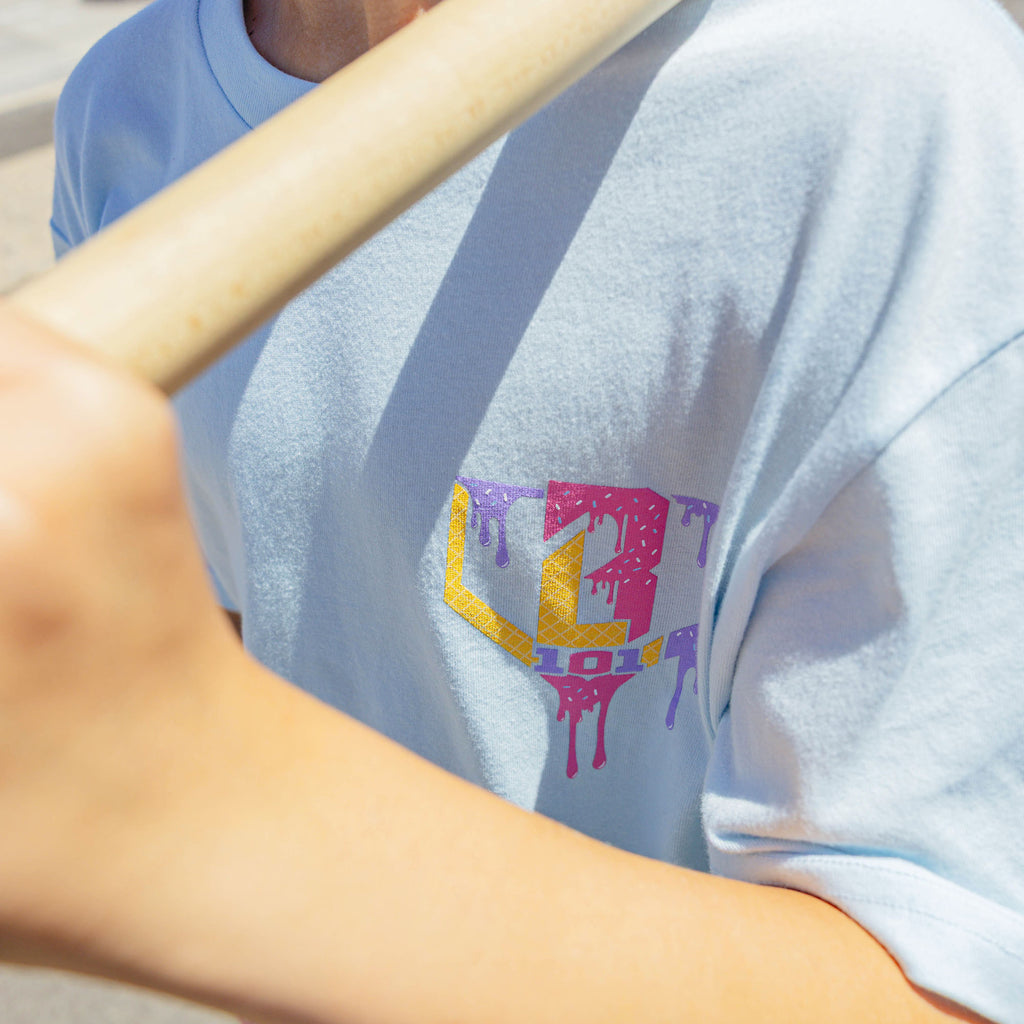 Youth model wearing blue Ice Cream Frosted youth graphic tee