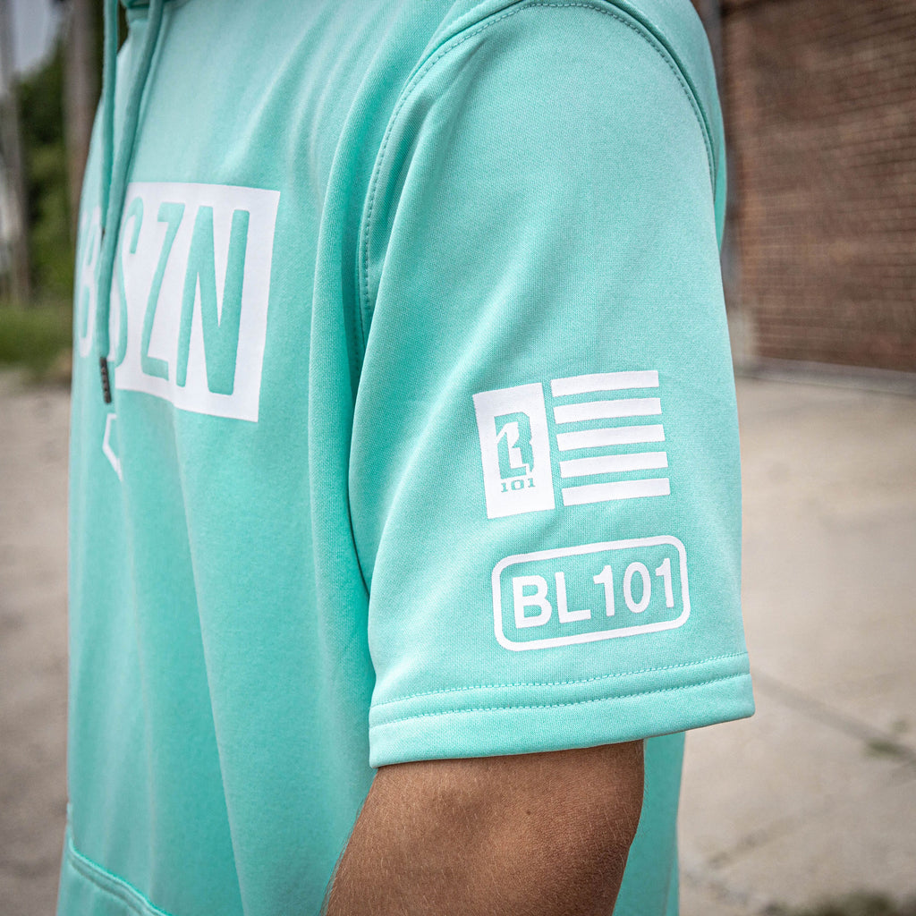 Adult model wearing mint and white BSBL-SZN short sleeve hoodie