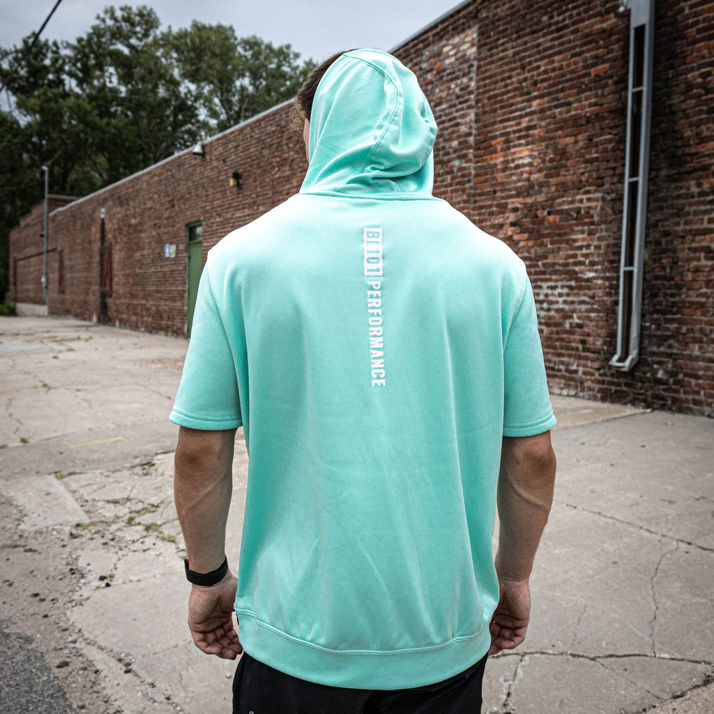 Adult model wearing mint and white BSBL-SZN short sleeve hoodie