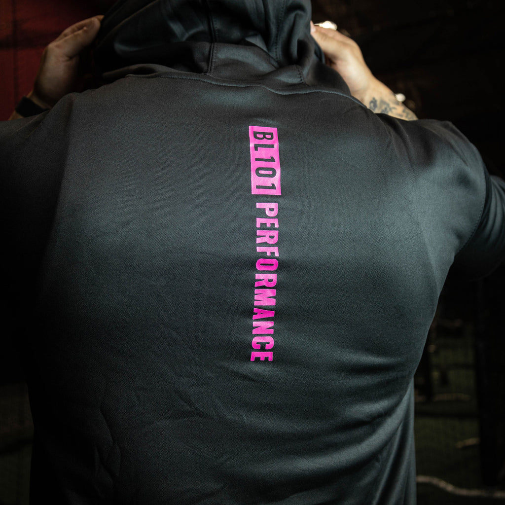 Youth model wearing black and pink BSBL-SZN youth short sleeve hoodie