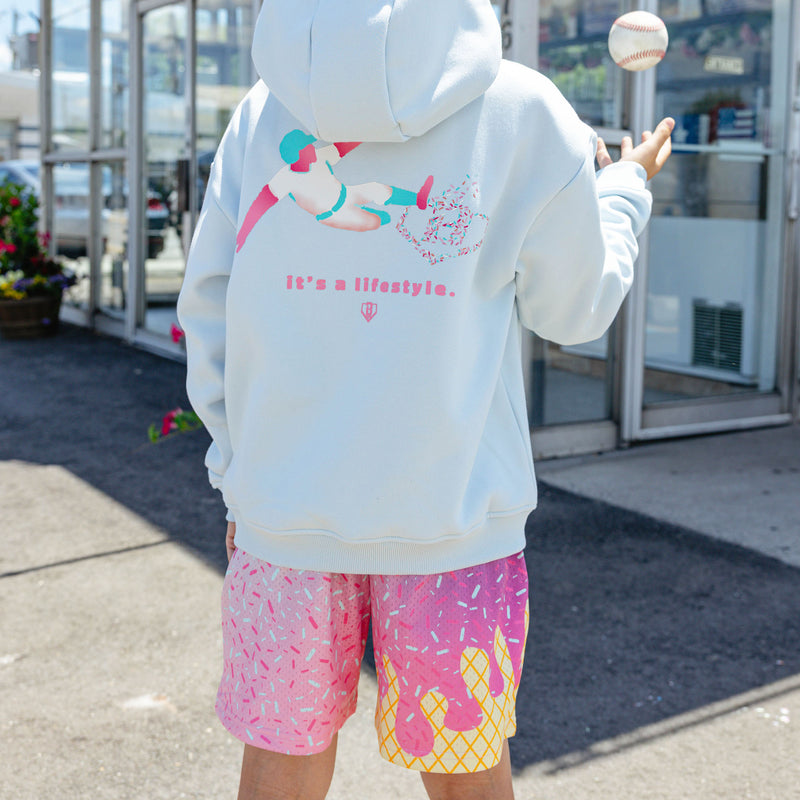 Youth model wearing youth hoodie with "Safe N Sweet" design
