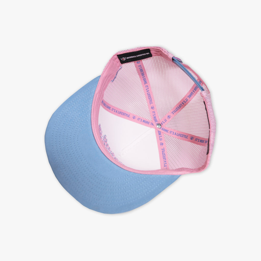 Adult model wearing signature Off Field Snapback Cotton Candy snapback