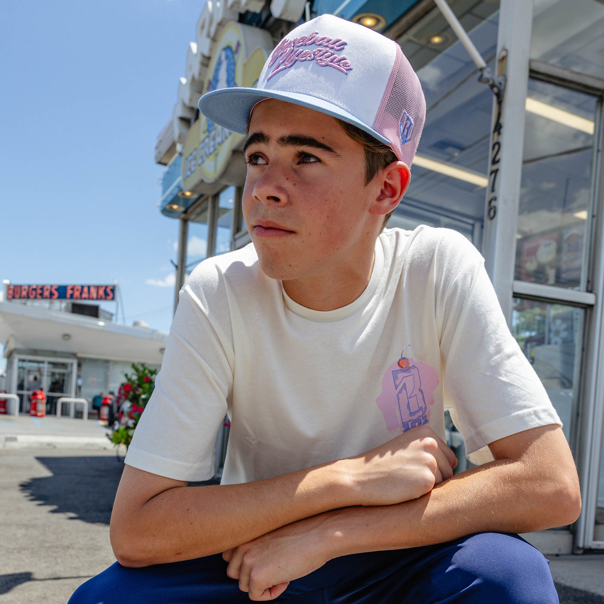Adult model wearing signature Off Field Snapback Cotton Candy snapback