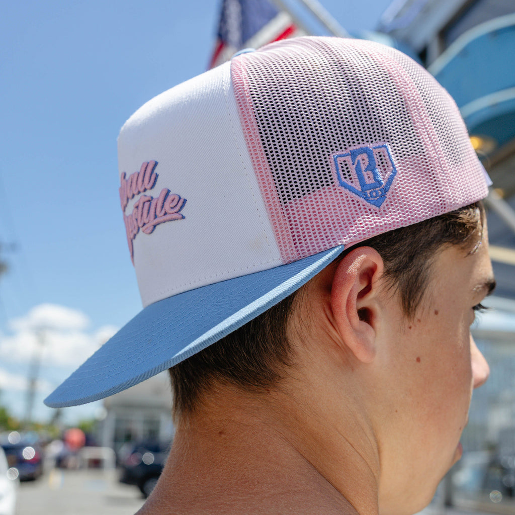 Adult model wearing signature Off Field Snapback Cotton Candy snapback