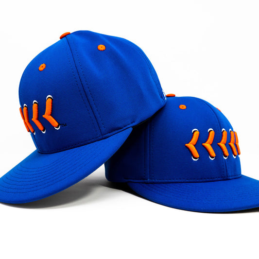 Blue fitted hat with orange stitching front and side view