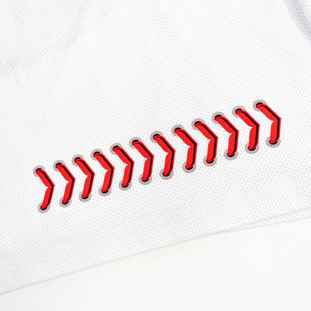 Closeup of baseball seams on white shorts baseball shorts for baseball players with baseball seams and baseball stitching