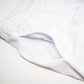 Closeup of white shorts pocket
