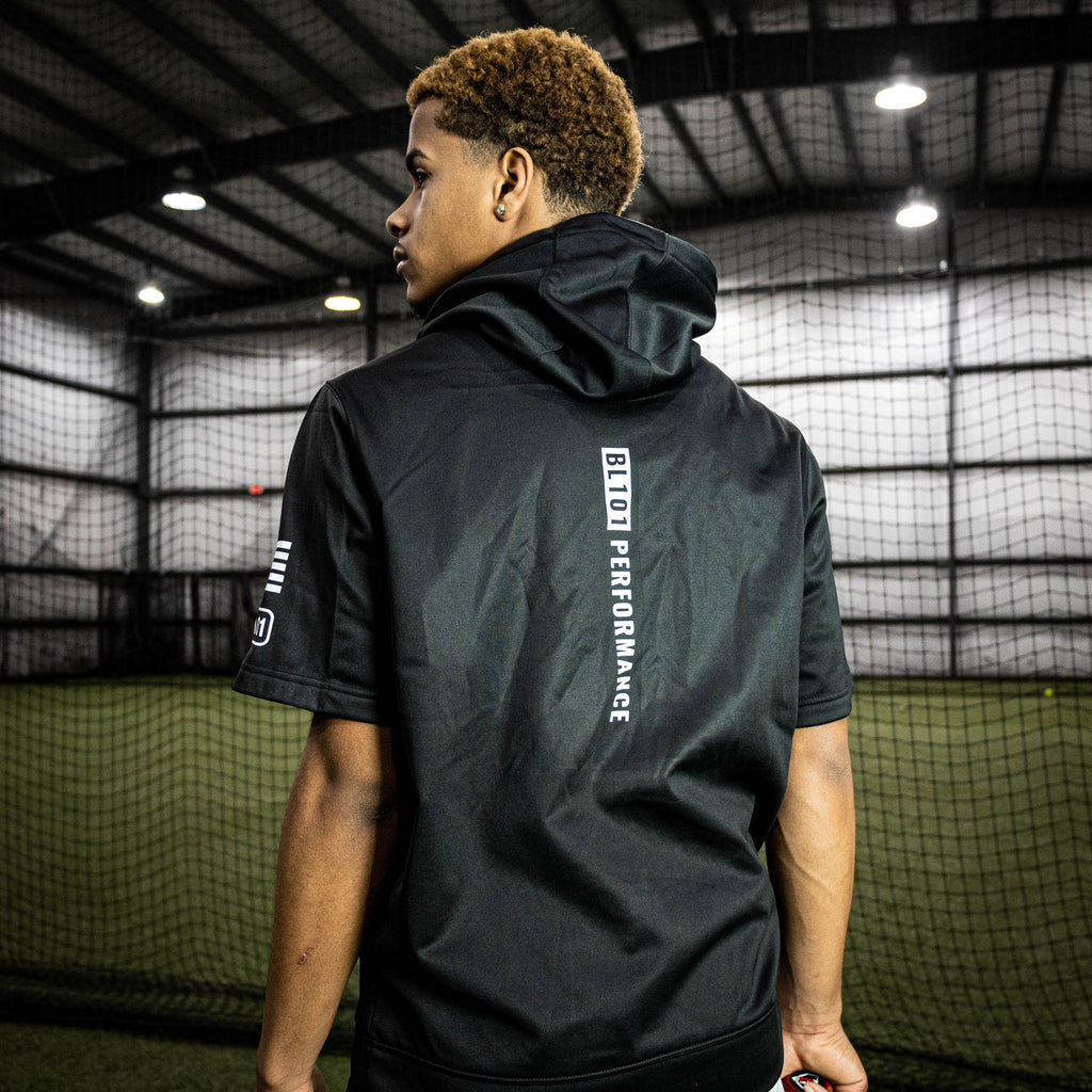 Adult model wearing black and white BSBL-SZN short sleeve hoodie
